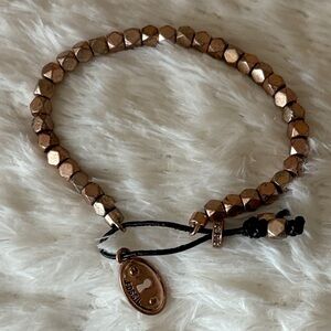 Fossil Vintage Keeper Beaded Bracelet, rose gold/pewter like color , fossil logo